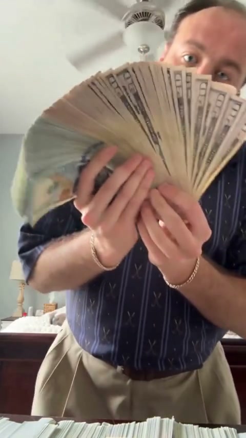 Earlier Money Spread AI example with a navy shirt